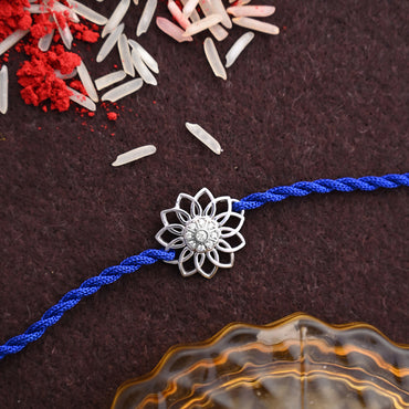 Silver Floral Rakhi with Roli Chawal for Bhai Brothers